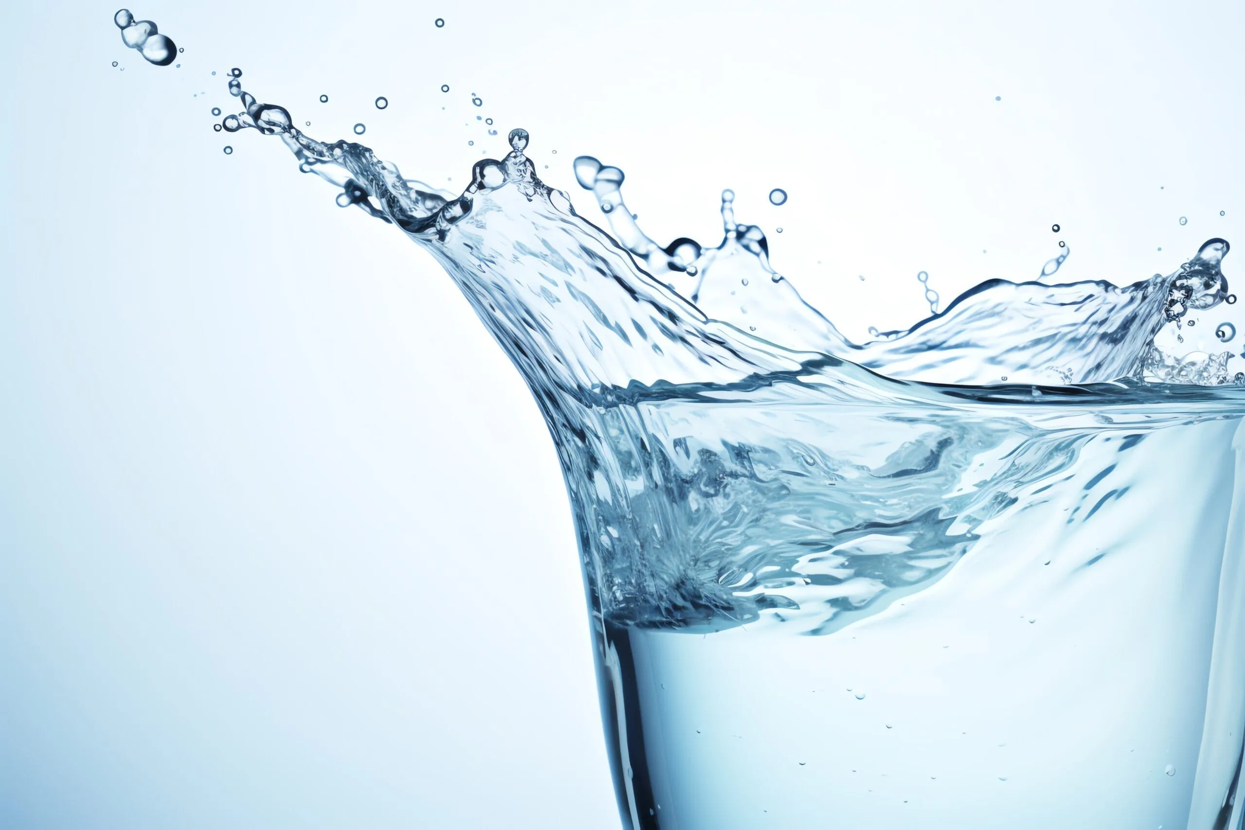 vecteezy_generate-an-image-of-a-glass-of-water-on-a-white-background_50024750-scaled.jpg